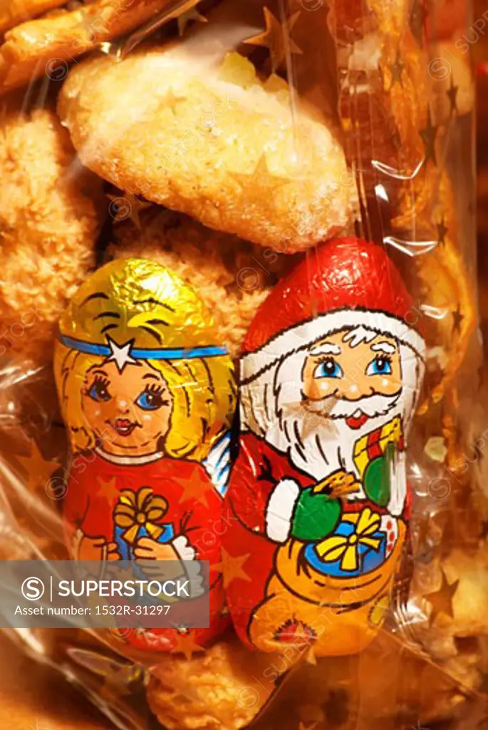 Christmas figures and cookies in starry bag
