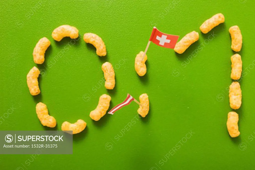 0:1 written in peanut puffs, flags of Austria & Switzerland
