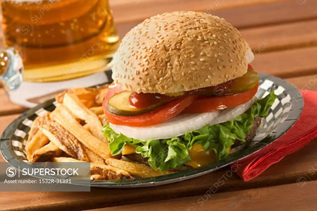 Hamburger with chips and beer