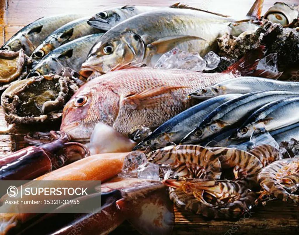 Fish and seafood on wooden background