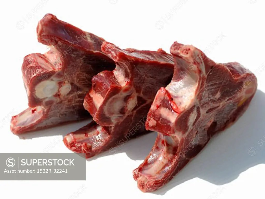 Three frozen lamb chops