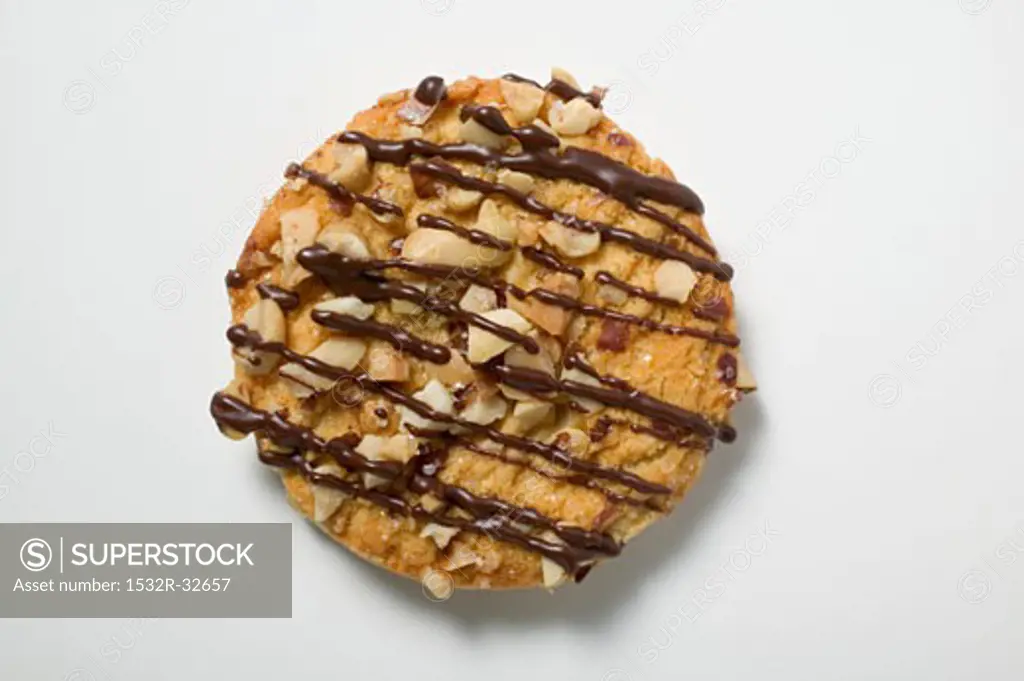 Christmas biscuit with nuts and chocolate drizzle