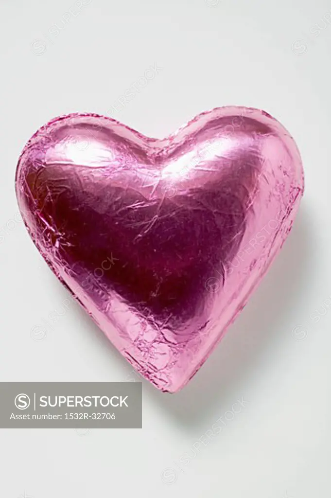Chocolate heart in pink foil