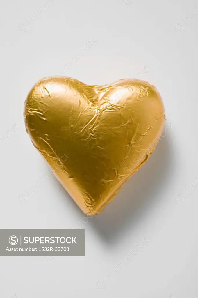 Chocolate heart in gold foil
