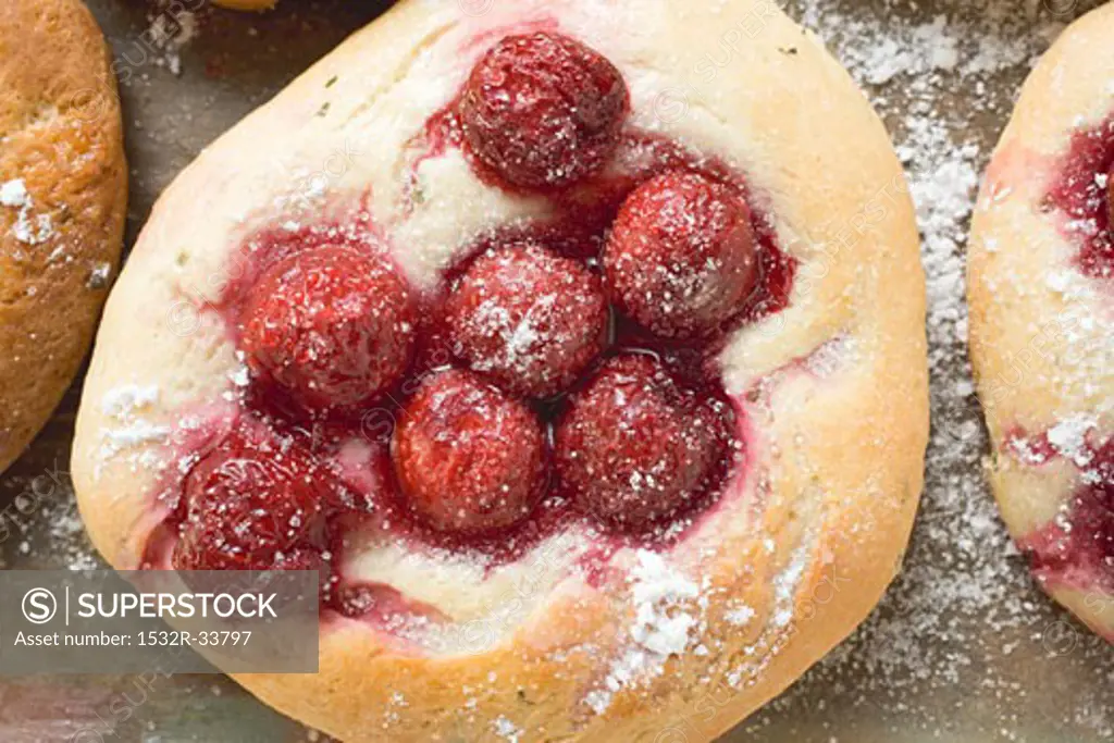Focaccia with cherries (overhead view)