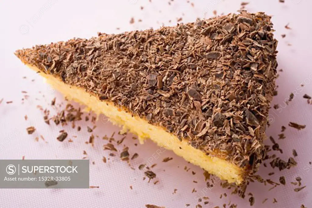 Piece of almond ricotta cake with dark chocolate