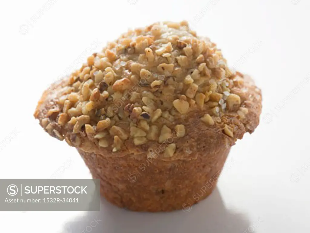 Muffin topped with chopped nuts