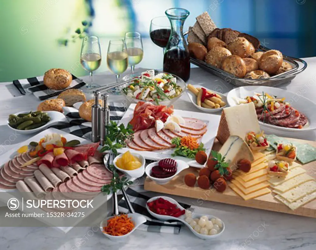 Cold buffet: cold cut platter, cheese, salad, bread & wine