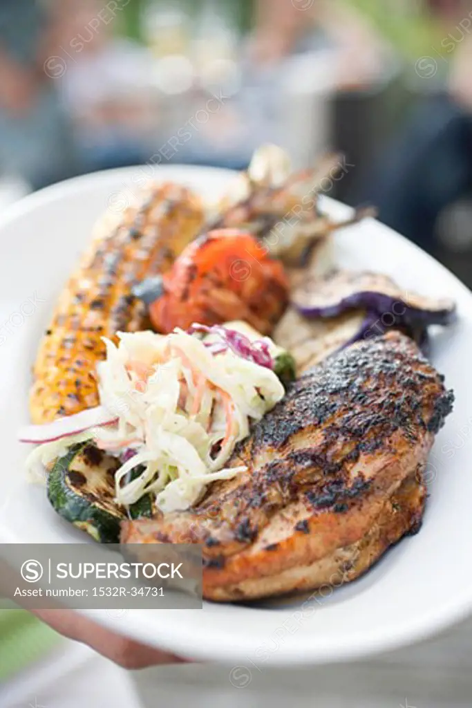 Grilled chicken breast with accompaniments