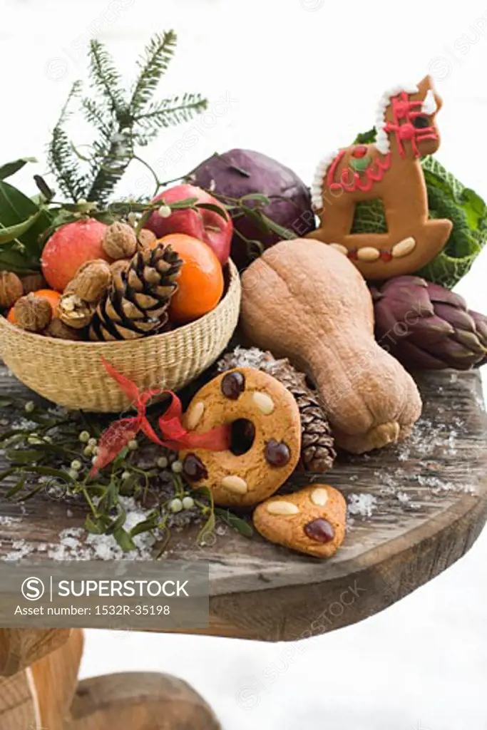 Christmas still life: fruit, vegetables, nuts & gingerbread