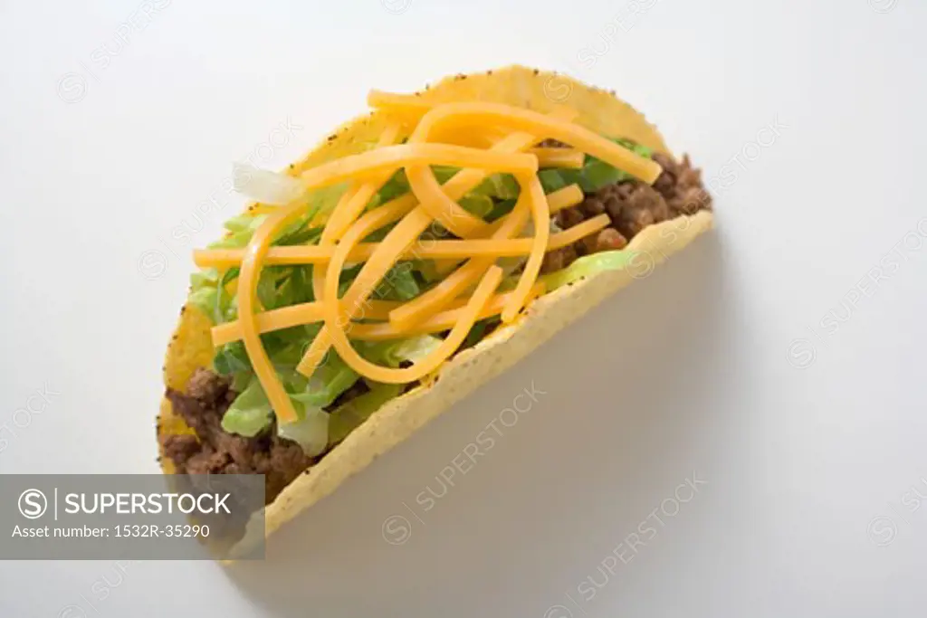 Taco with mince, lettuce and cheese (overhead view)