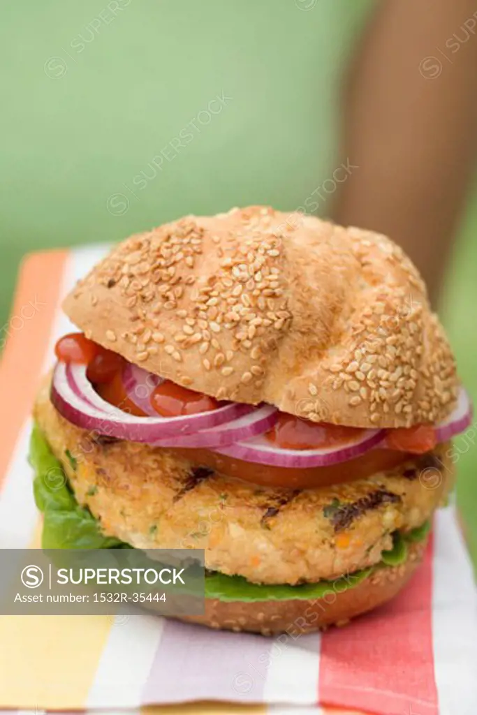 Woman holding grilled vegetable burger