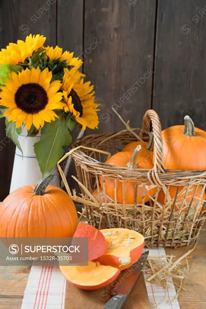 Rustic pumpkin still life with sunflowers