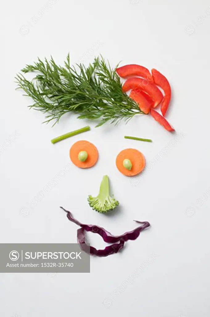 Amusing face made from vegetables and dill