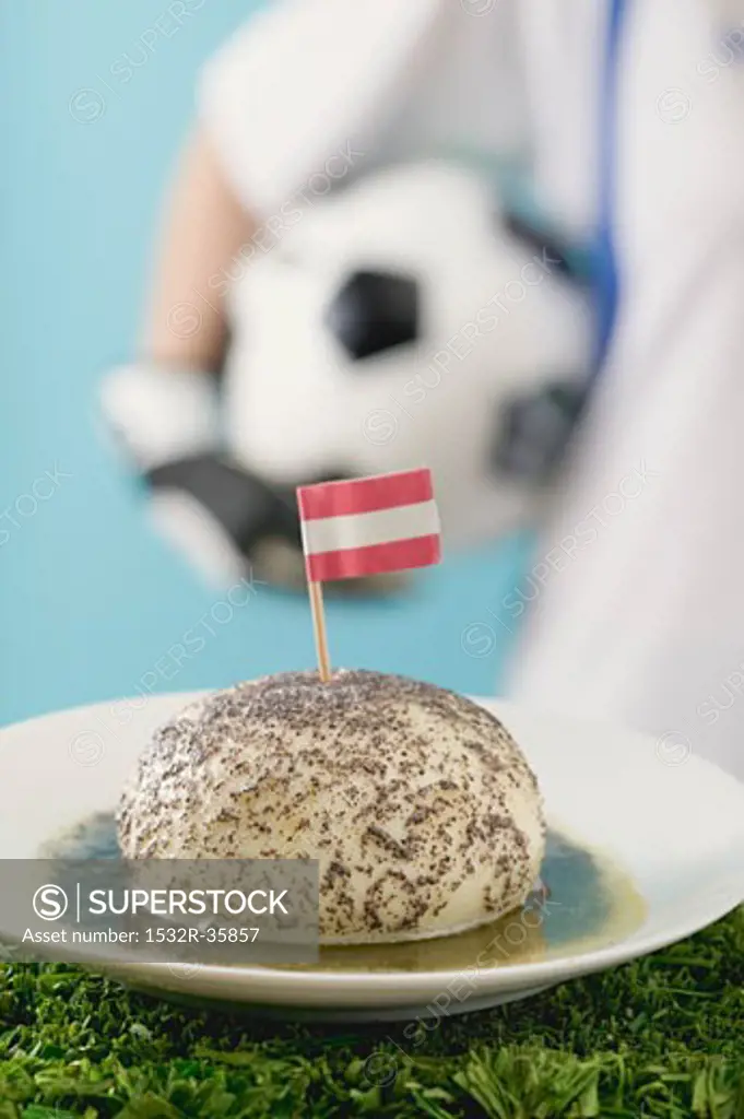 Yeast dumpling with flag, footballer in background