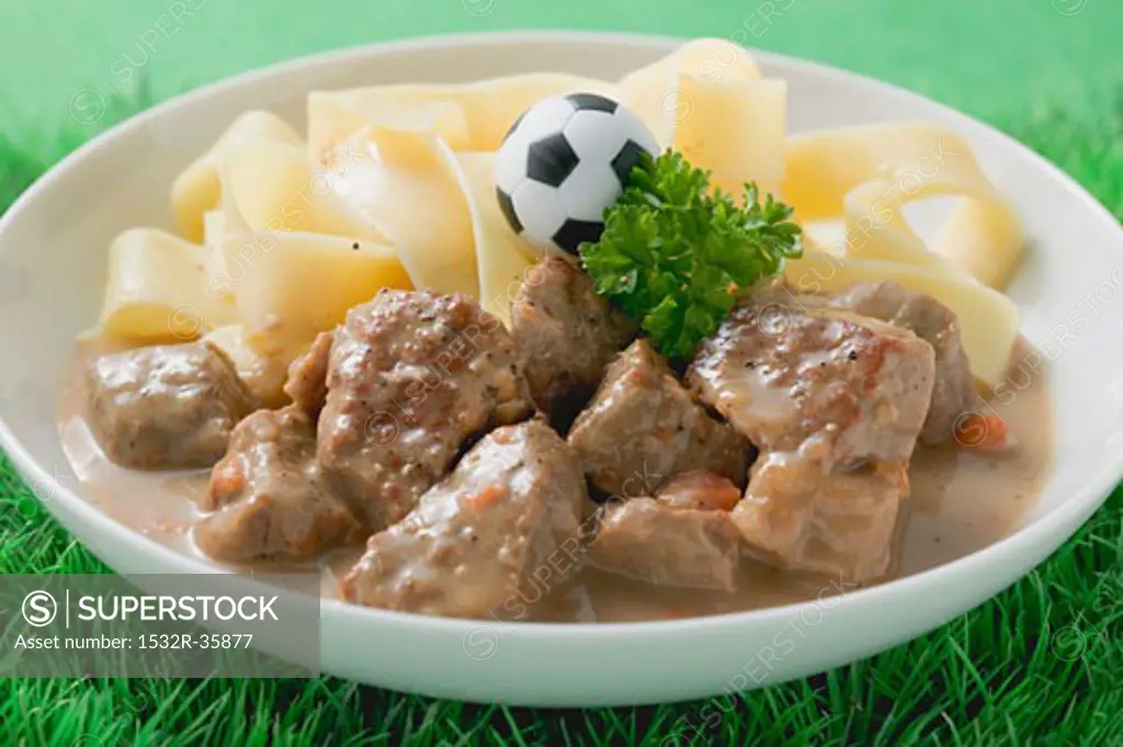 Zürcher Geschnetzeltes (veal dish) with ribbon pasta & toy football