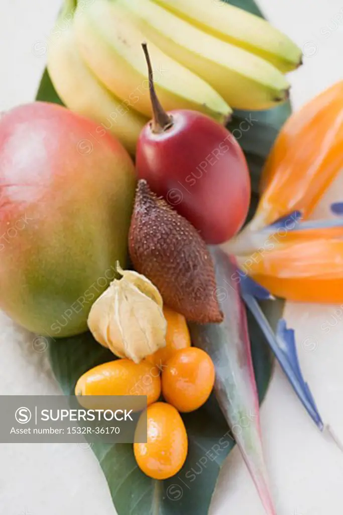 Assorted exotic fruits on banana leaf