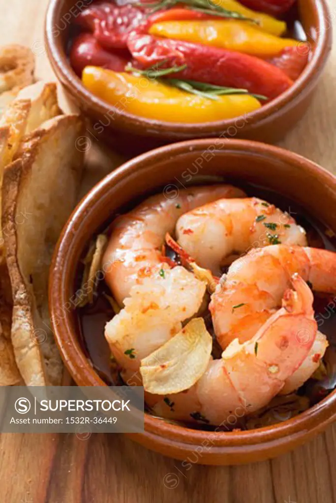 Garlic prawns, toasted bread and marinated peppers