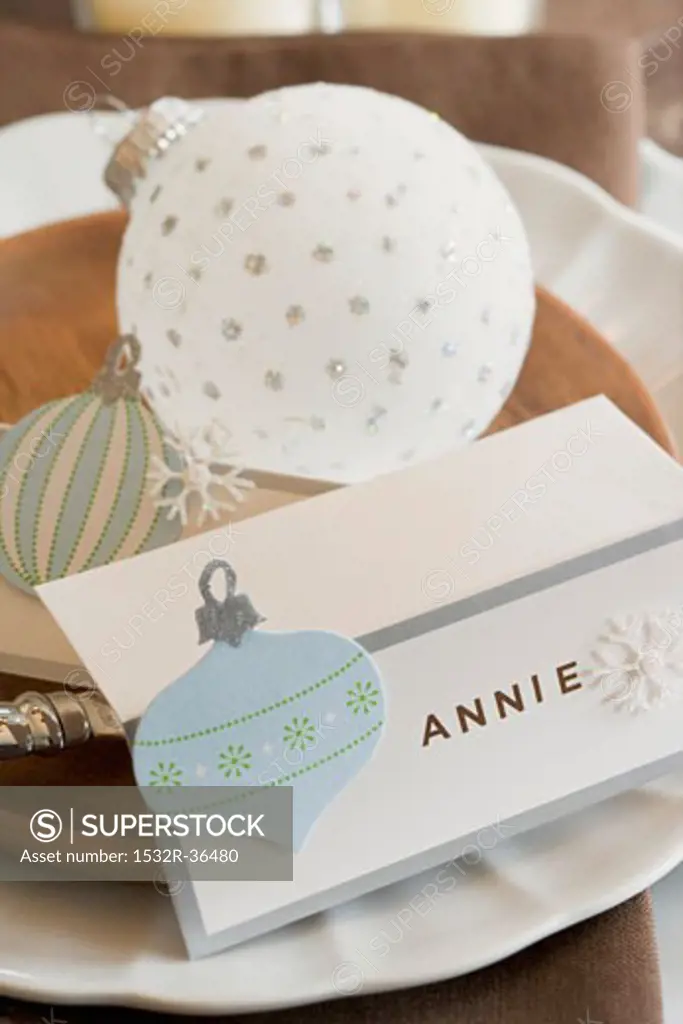 Christmas place-setting with place card and bauble