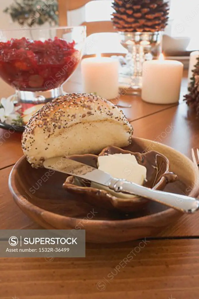 Poppy seed roll and butter on Christmas table (USA)