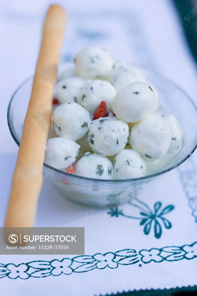 Marinated mozzarella balls with grissini