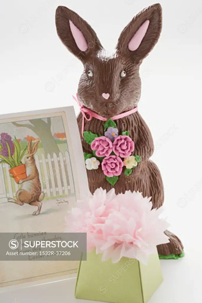 A chocolate Easter Bunny with Easter card and gift
