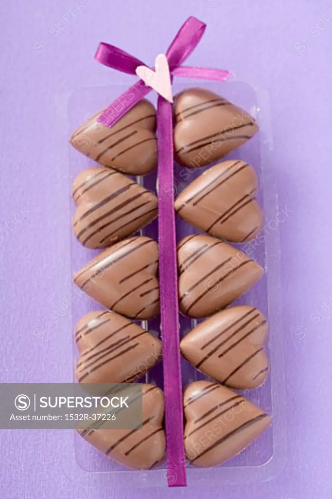 Several heart-shaped chocolates