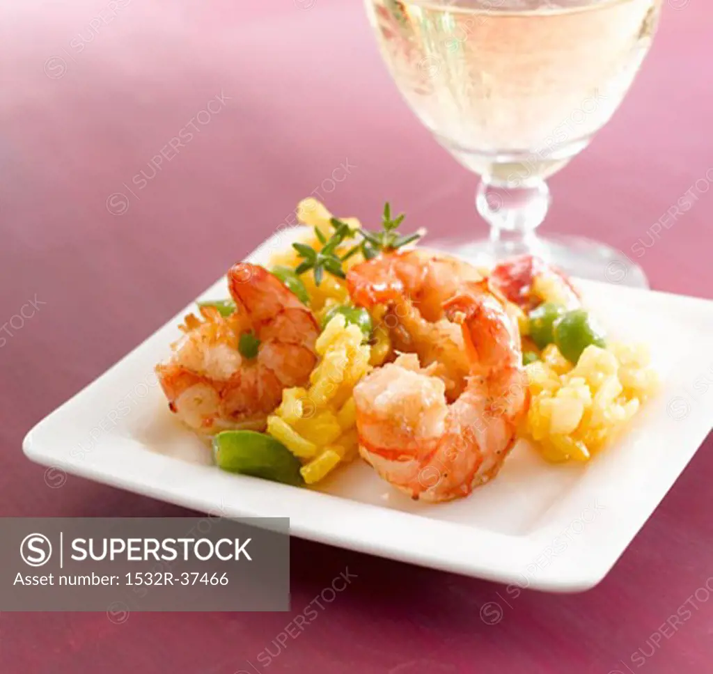 Risotto with prawns and a glass of white wine