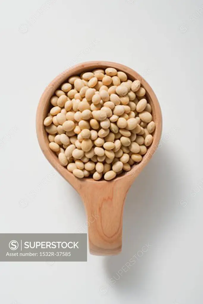 Soya beans in a small wooden bowl