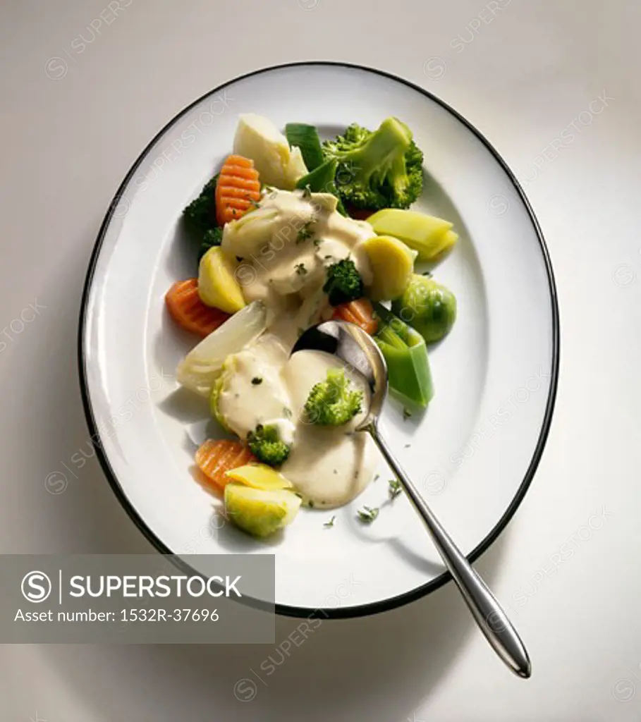 Steamed vegetables with cheese sauce
