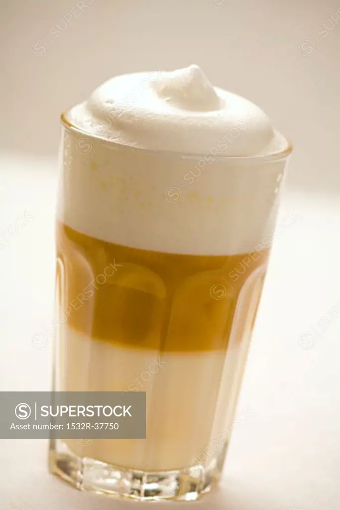 A glass of latte macchiato