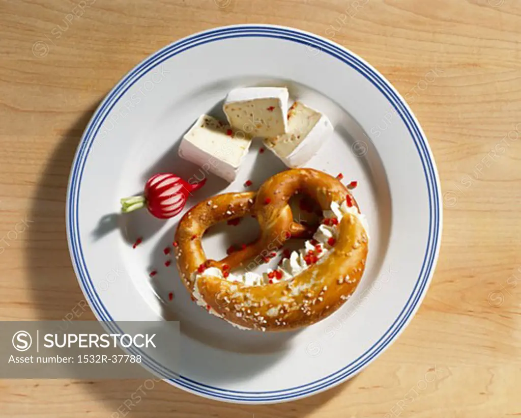 Pretzel filled with soft cheese and Camembert