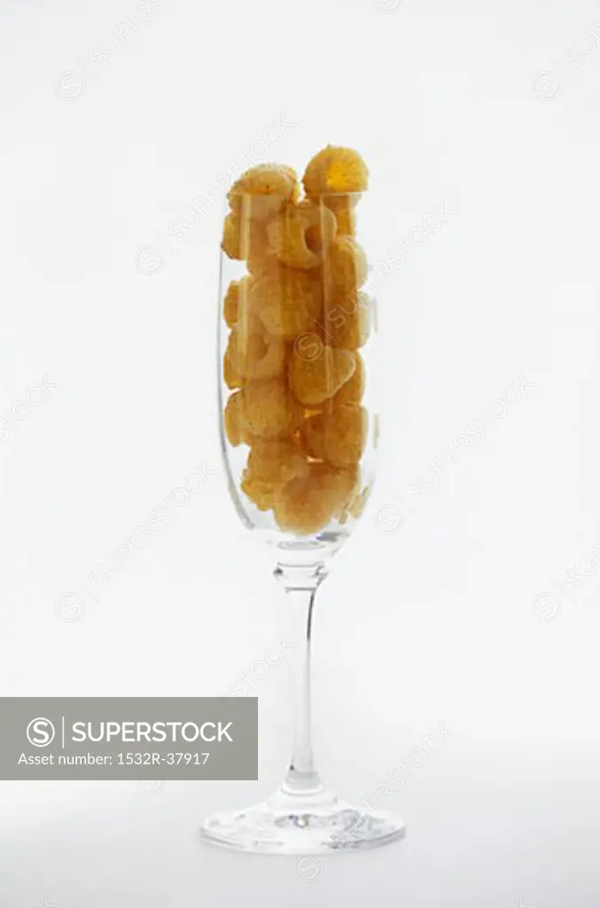 Golden Raspberries in a Champagne Glass