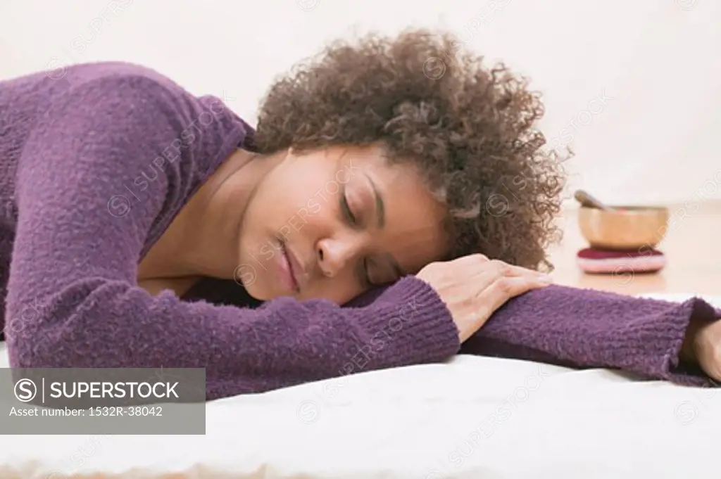 Young woman asleep during a relaxation exercise