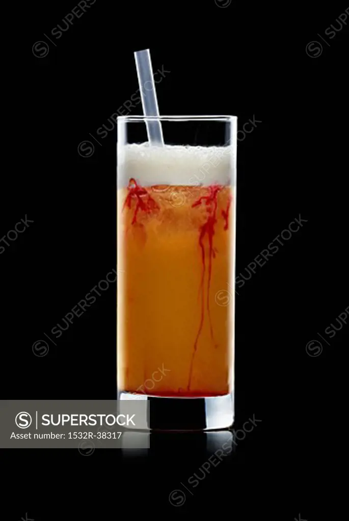 Zombie (Cocktail made with rum, fruit juices, ice cubes)