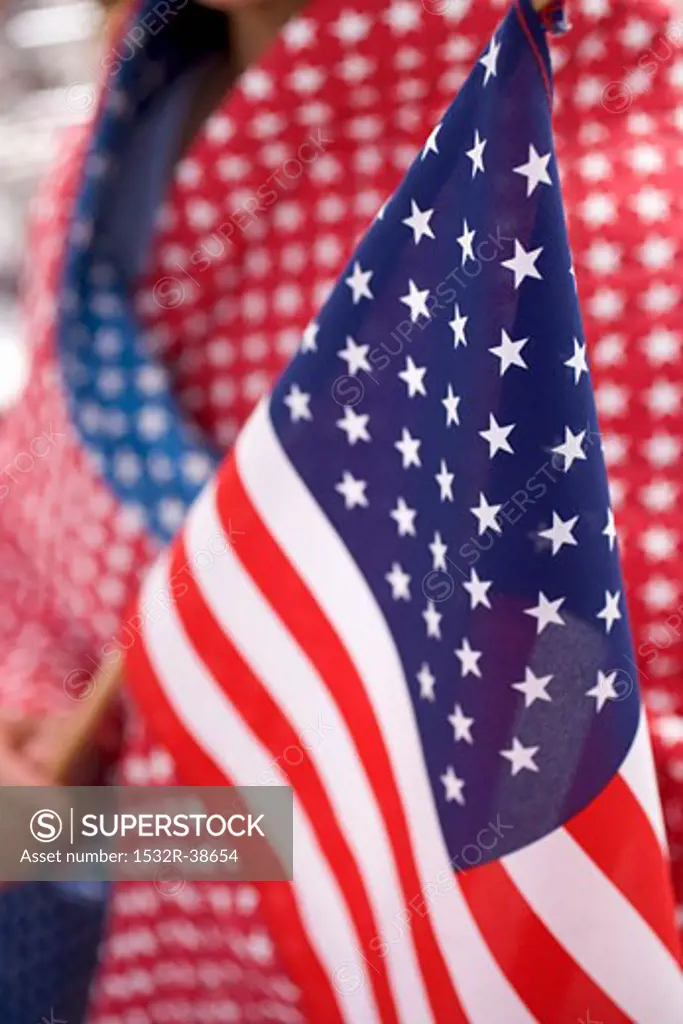 Person holding American flag (4th of July, USA)