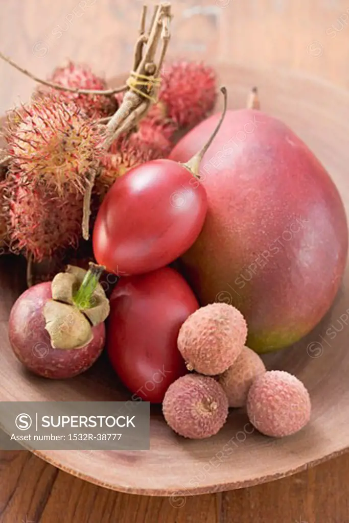 Assorted exotic fruits in a dish
