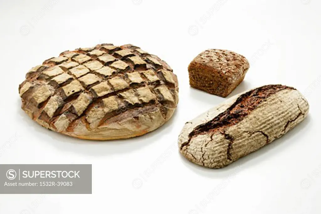 Three different loaves of wood-oven bread