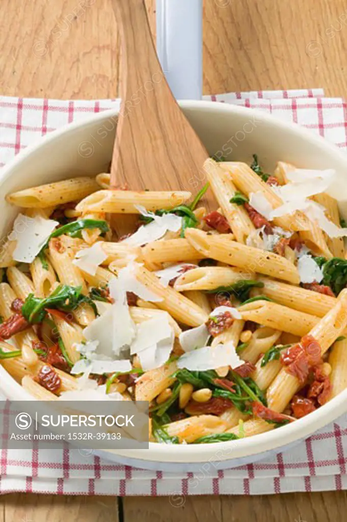 Penne with dried tomatoes, pine nuts and Parmesan