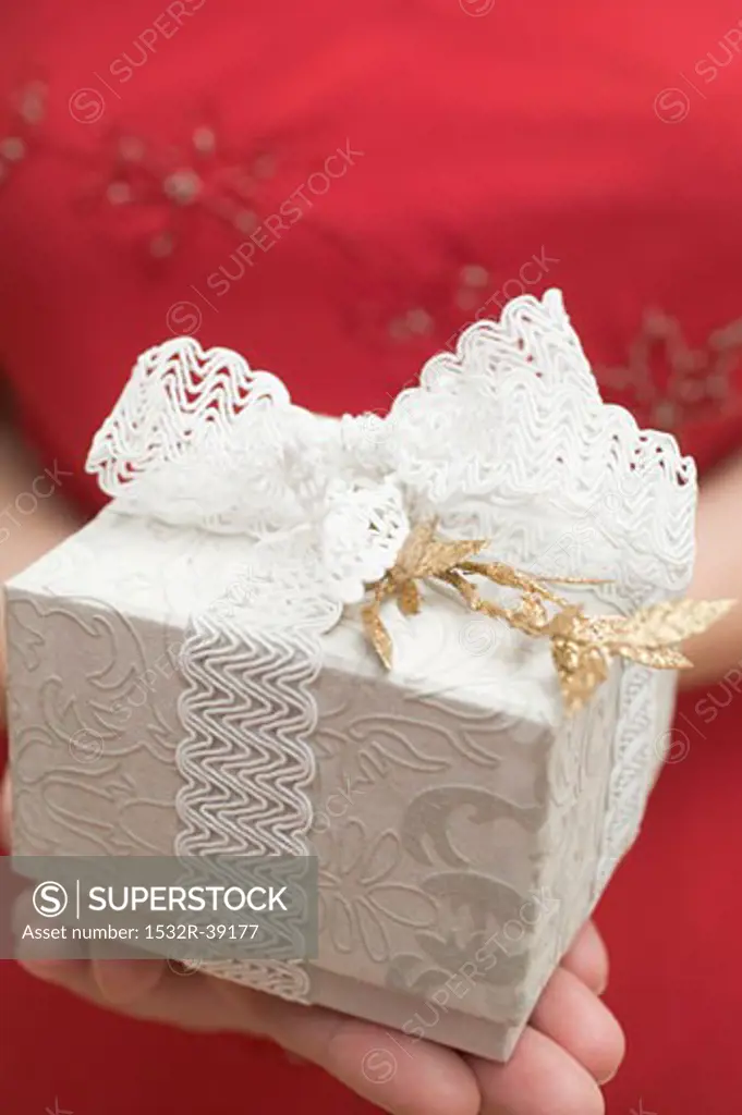 Woman holding Christmas gift