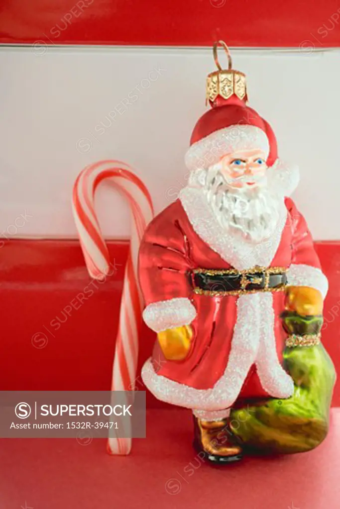 Christmas tree ornament (Father Christmas) and candy cane