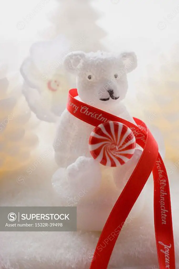 Polar bear candle with peppermint and ribbon