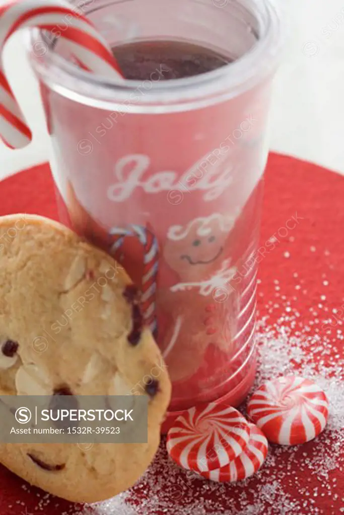 Christmas drink with sweets and cranberry cookie