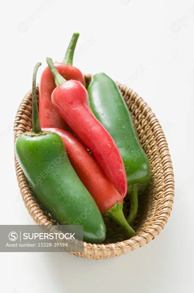 Red and green chillies in basket