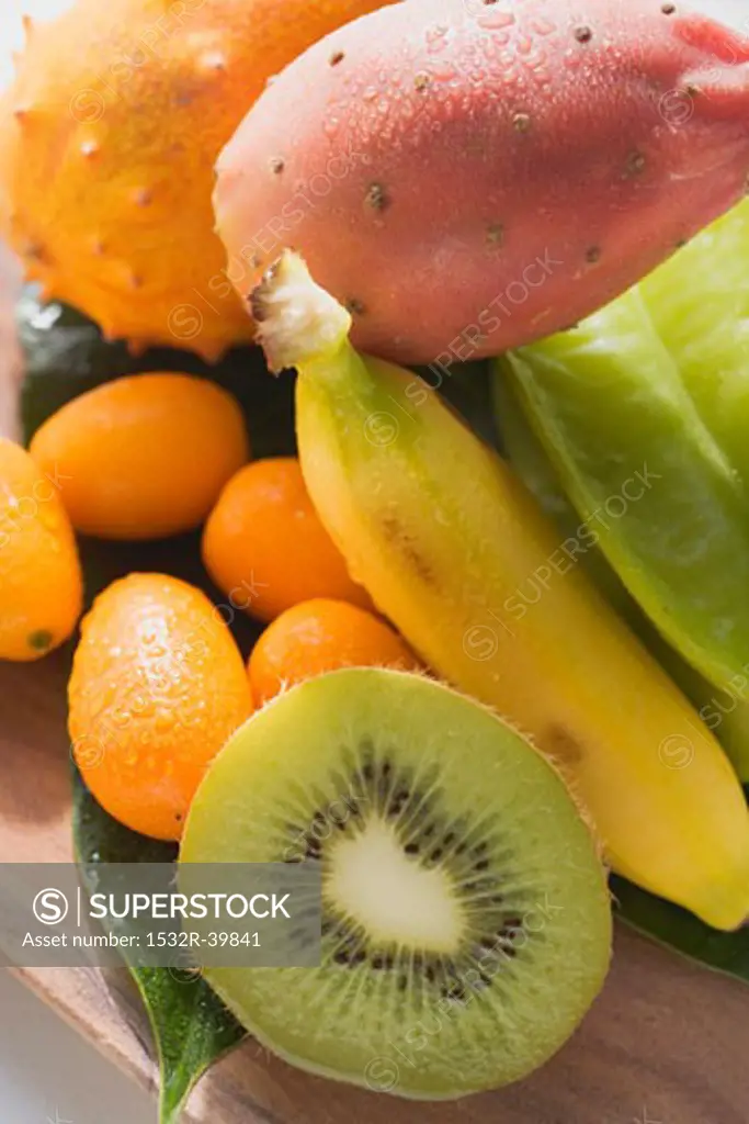 Exotic fruit still life with kiwi fruit, kumquats, banana