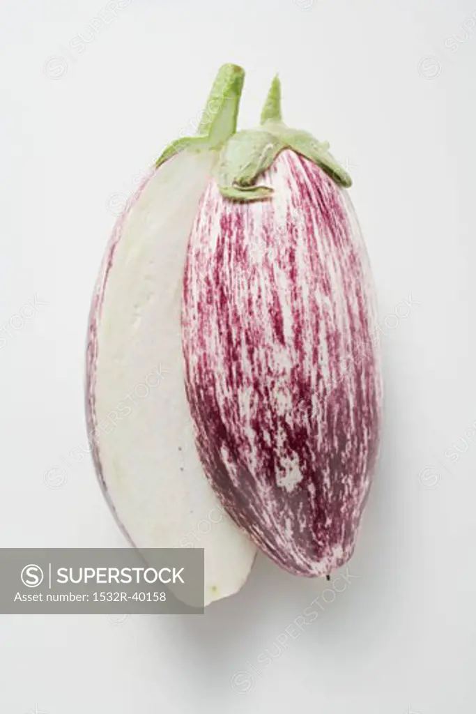 Purple and white striped aubergine, halved
