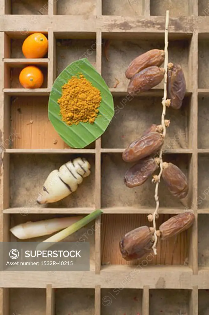 Exotic fruit, vegetables and spices in type case