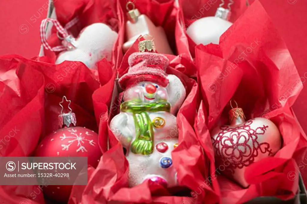 Various Christmas decorations in red paper