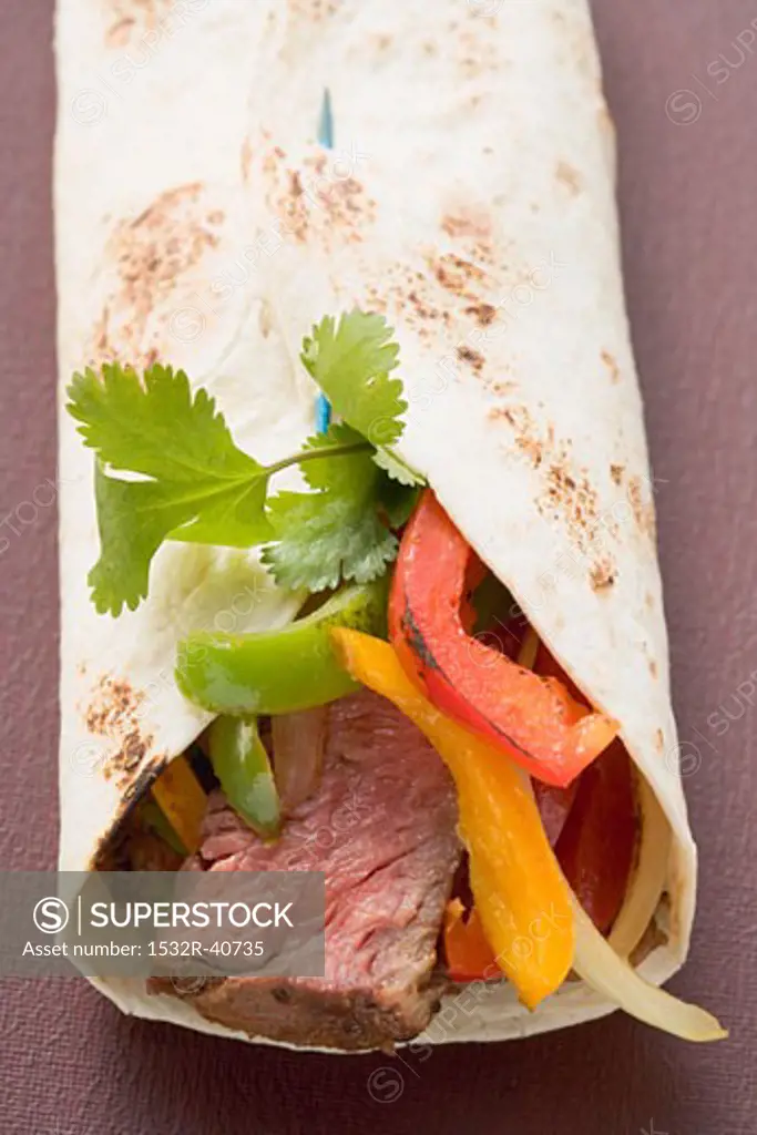 Wrap filled with beef and peppers