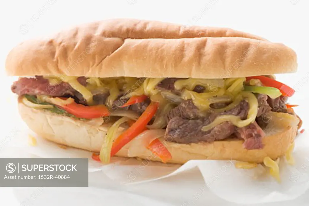 Steak sandwich with peppers and cheese